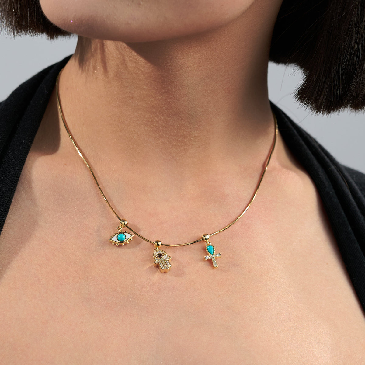 Turquoise Evil Eye Protection Charm — product and styling view 2