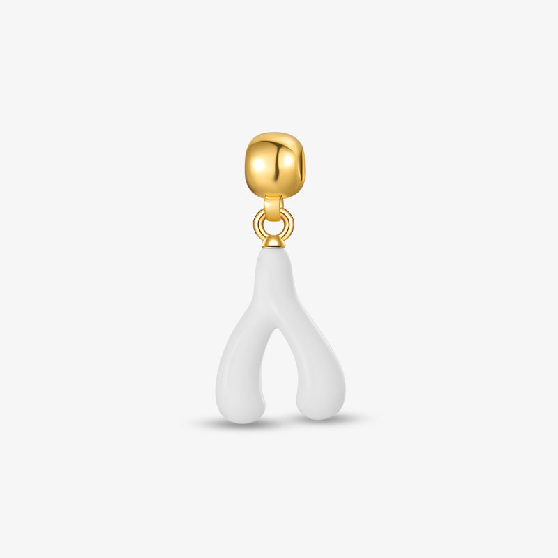 White Enamel Lucky Wishbone Charm — product and styling view 1