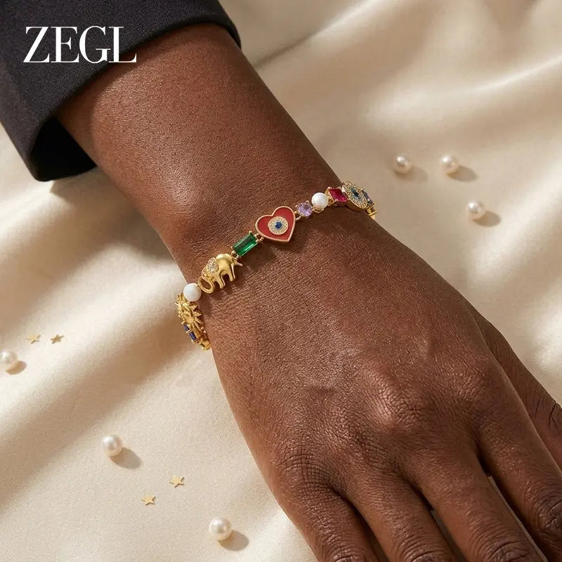 ZEGL 18K Gold Symbol Charm Bracelet — product and styling view 2