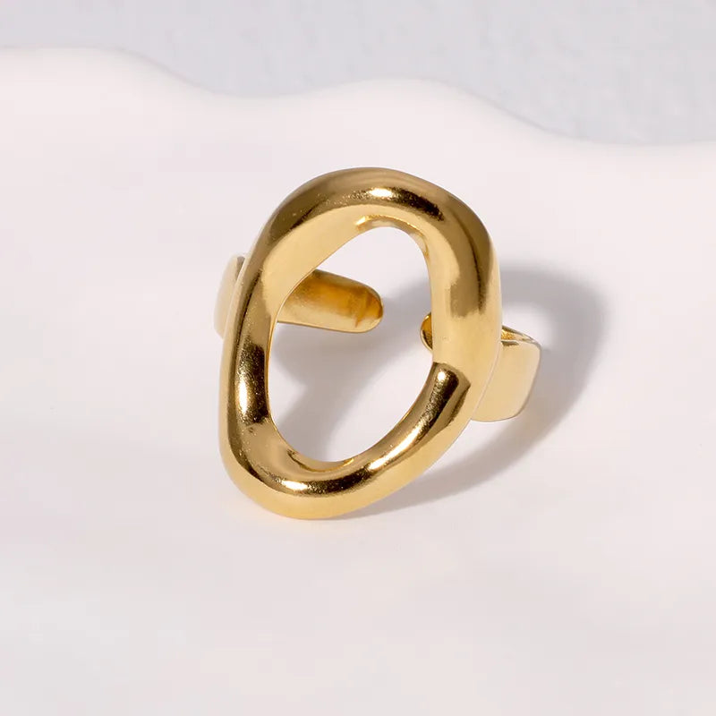 Gold-tone open curve ring with no stones, supplier SKU NH40393874