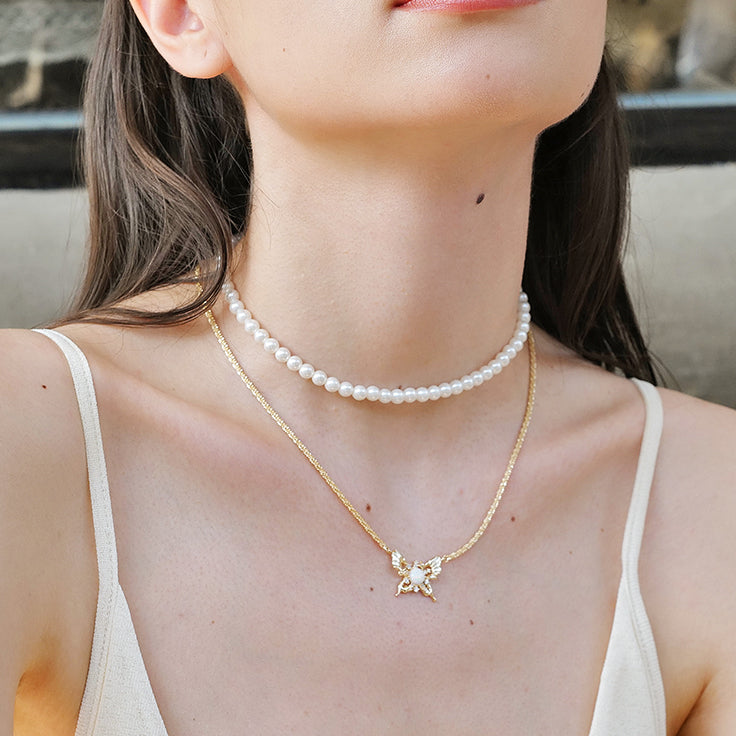 Pearl Sunburst Necklace — product and styling view 3