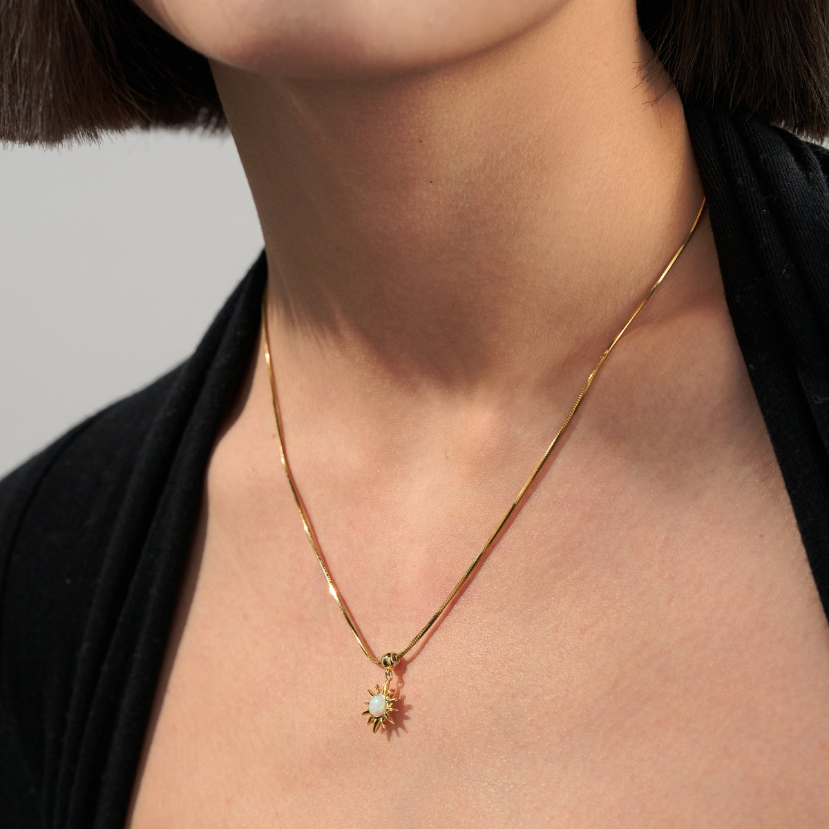 Opal Sunburst Celestial Charm — product and styling view 2