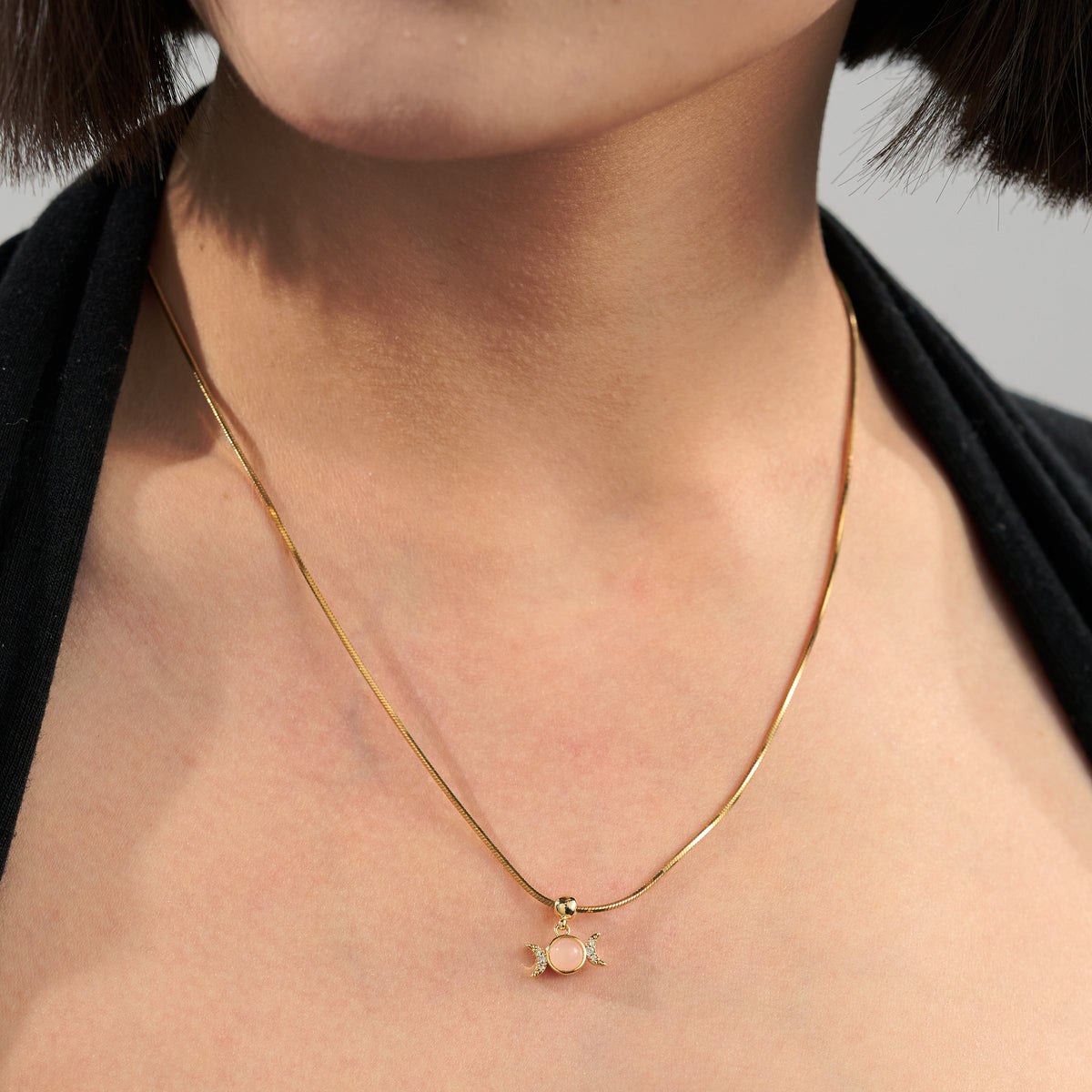 Pink Stone Triple Moon Goddess Charm — product and styling view 2