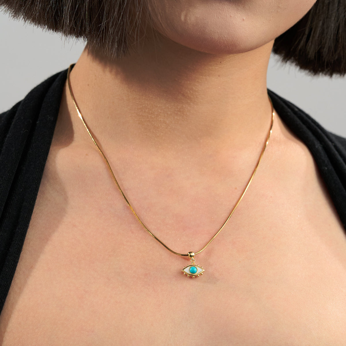 Turquoise Evil Eye Protection Charm — product and styling view 5