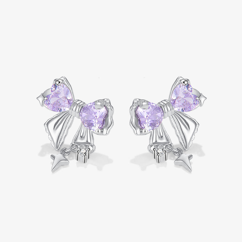 Luxe Bow Tassel Earrings — product and styling view 2